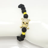 Black Lava/Gold Cross Rhinestone Skull